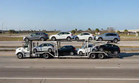 Multi-level car carrier on the highway to Miramar, Florida, United States