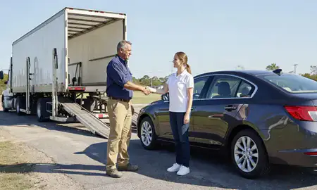 Vehicle owner beside their delivered car in Ocala, Florida, United States