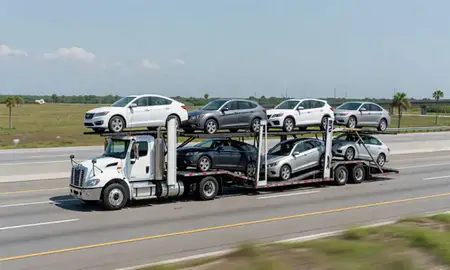 Multi-level car carrier on the highway to Pembroke Pines, Florida, United States