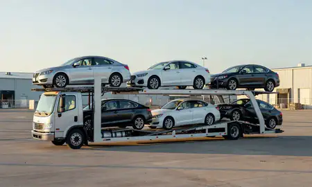 Car transporter loaded with vehicles in Albany, Georgia, United States