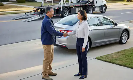 Vehicle owner beside their delivered car in Brookhaven, Georgia, United States