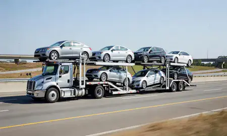 Multi-level car carrier on the highway to Dunwoody, Georgia, United States