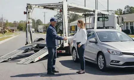 Vehicle owner beside their delivered car in Johns Creek, Georgia, United States