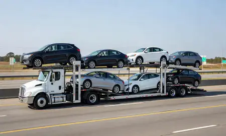 Multi-level car carrier on the highway to Marietta, Georgia, United States
