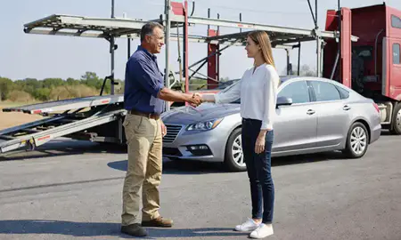 Vehicle owner beside their delivered car in Peachtree Corners, Georgia, United States