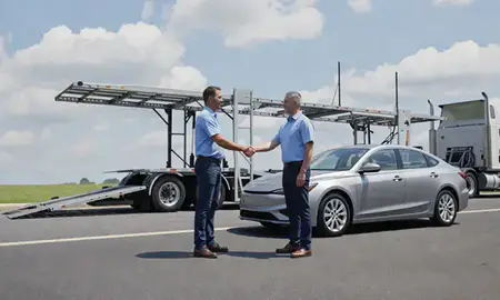 Vehicle owner beside their delivered car in Sandy Springs, Georgia, United States
