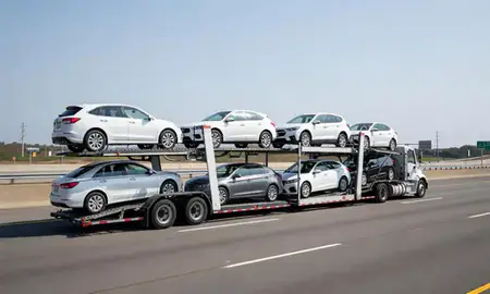 Multi-level car carrier on the highway to Stonecrest, Georgia, United States