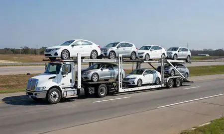 Multi-level car carrier on the highway to Valdosta, Georgia, United States