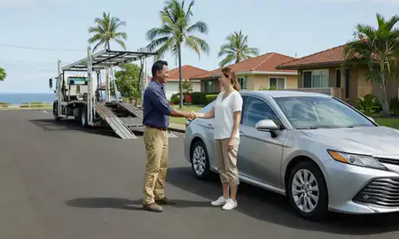 Vehicle owner beside their delivered car in East Honolulu, Hawaii, United States
