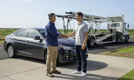Vehicle owner beside their delivered car in Ewa Gentry, Hawaii, United States