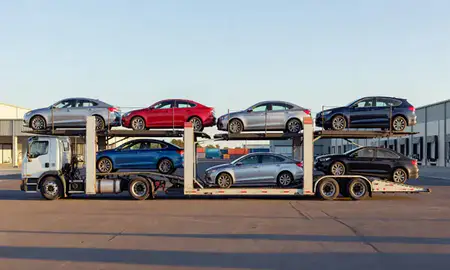 Car transporter parked in an industrial area of Ewa Gentry, Hawaii, United States