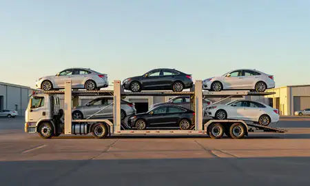 Car transporter parked in an industrial area of Halawa, Hawaii, United States