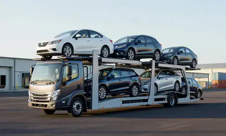 Car transporter loaded with vehicles in Halawa, Hawaii, United States
