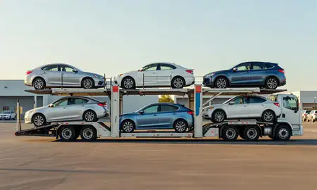 Car transporter parked in an industrial area of Hawaiian Paradise Park, Hawaii, United States