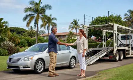Vehicle owner beside their delivered car in Kailua, Hawaii, United States