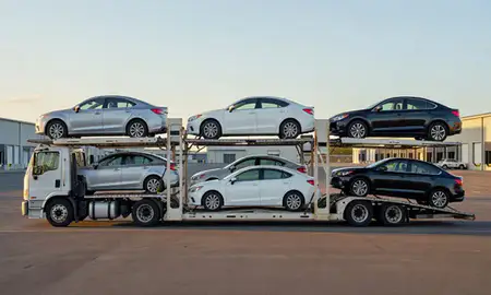 Car transporter parked in an industrial area of Kapaa, Hawaii, United States
