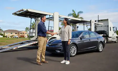 Vehicle owner beside their delivered car in Kapolei, Hawaii, United States