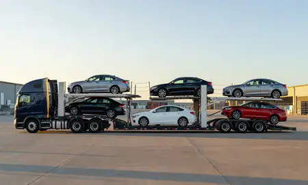 Car transporter parked in an industrial area of Kihei, Hawaii, United States