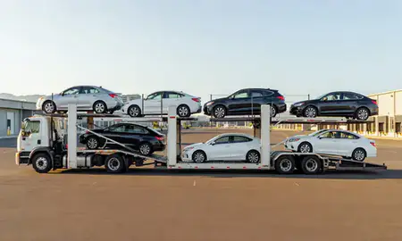 Car transporter parked in an industrial area of Mililani Town, Hawaii, United States