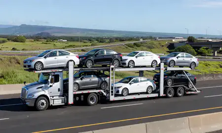 Multi-level car carrier on the highway to Royal Kunia, Hawaii, United States