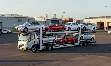 Car transporter loaded with vehicles in Royal Kunia, Hawaii, United States