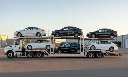 Car transporter parked in an industrial area of Wahiawa, Hawaii, United States