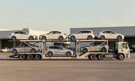 Car transporter parked in an industrial area of Waianae, Hawaii, United States