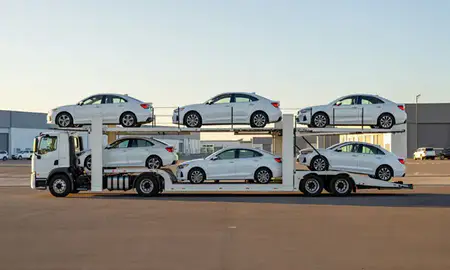 Car transporter parked in an industrial area of Wailuku, Hawaii, United States