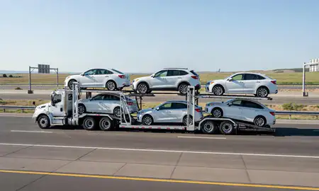 Multi-level car carrier on the highway to Ammon, Idaho, United States