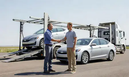 Vehicle owner beside their delivered car in Burley, Idaho, United States