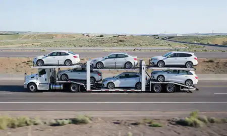 Multi-level car carrier on the highway to Caldwell, Idaho, United States