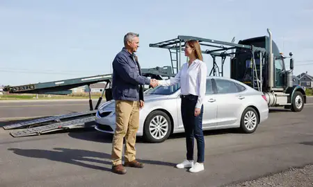 Vehicle owner beside their delivered car in Coeur d'Alene, Idaho, United States