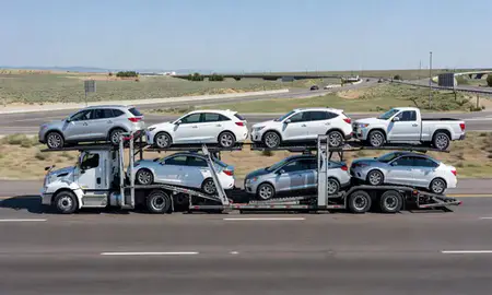 Multi-level car carrier on the highway to Eagle, Idaho, United States