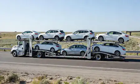 Multi-level car carrier on the highway to Emmett, Idaho, United States