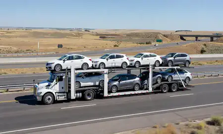 Multi-level car carrier on the highway to Fruitland, Idaho, United States