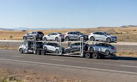 Multi-level car carrier on the highway to Hailey, Idaho, United States