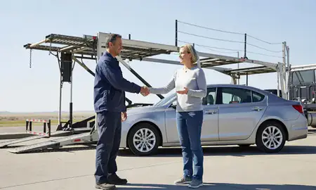 Vehicle owner beside their delivered car in Idaho Falls, Idaho, United States