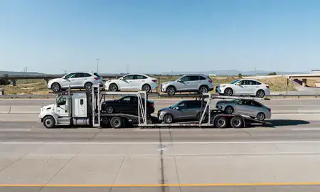 Multi-level car carrier on the highway to Jerome, Idaho, United States