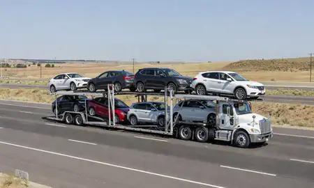 Multi-level car carrier on the highway to Kuna, Idaho, United States