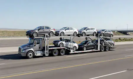 Multi-level car carrier on the highway to Middleton, Idaho, United States