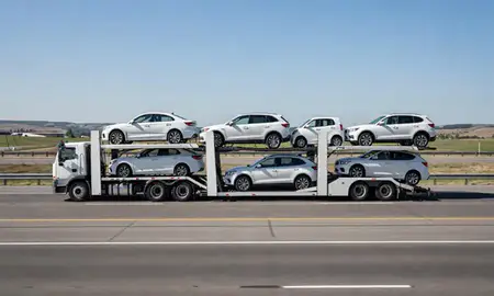 Multi-level car carrier on the highway to Moscow, Idaho, United States
