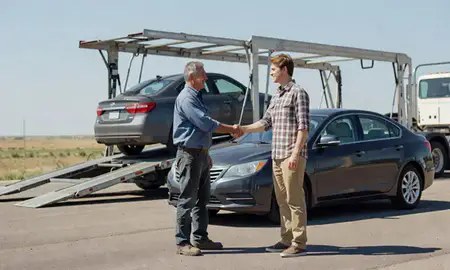 Vehicle owner beside their delivered car in Pocatello, Idaho, United States