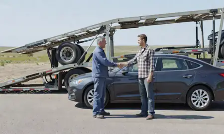 Vehicle owner beside their delivered car in Star, Idaho, United States