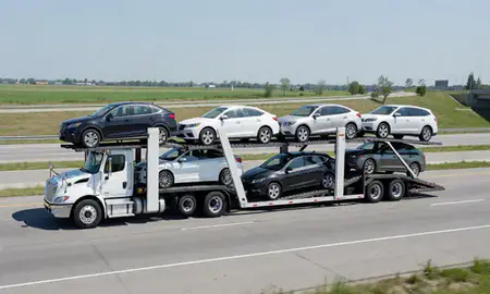 Multi-level car carrier on the highway to Alton, Illinois, United States