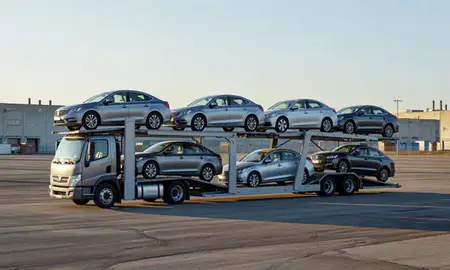 Car transporter loaded with vehicles in Berwyn, Illinois, United States