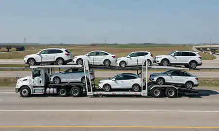 Multi-level car carrier on the highway to Champaign, Illinois, United States