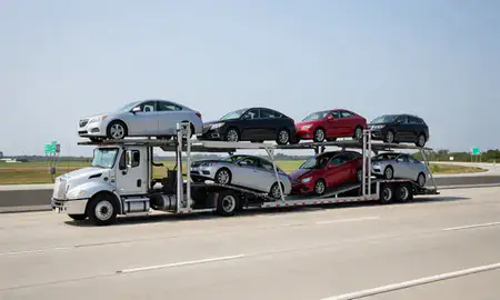 Multi-level car carrier on the highway to Des Plaines, Illinois, United States