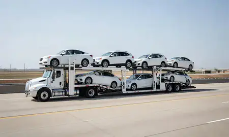 Multi-level car carrier on the highway to Joliet, Illinois, United States