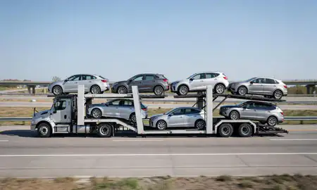 Multi-level car carrier on the highway to Wheaton, Illinois, United States