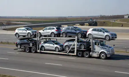 Multi-level car carrier on the highway to Indiana, United States